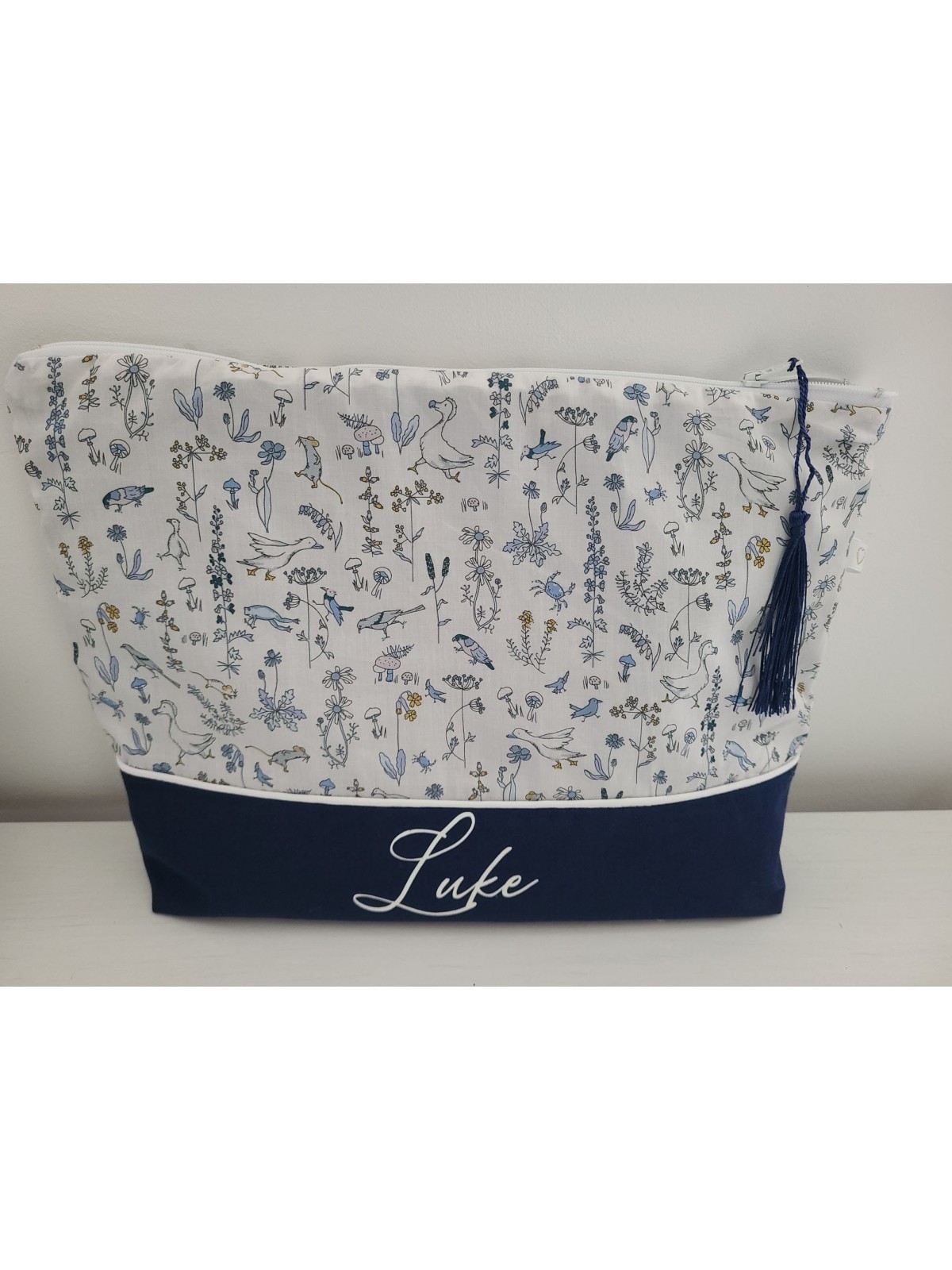 Trousse de toilette personnalisée pour bébé en liberty (doublée de coton enduit)